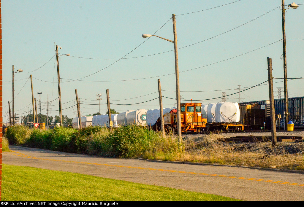 QTTX Flat cars with load in the yard